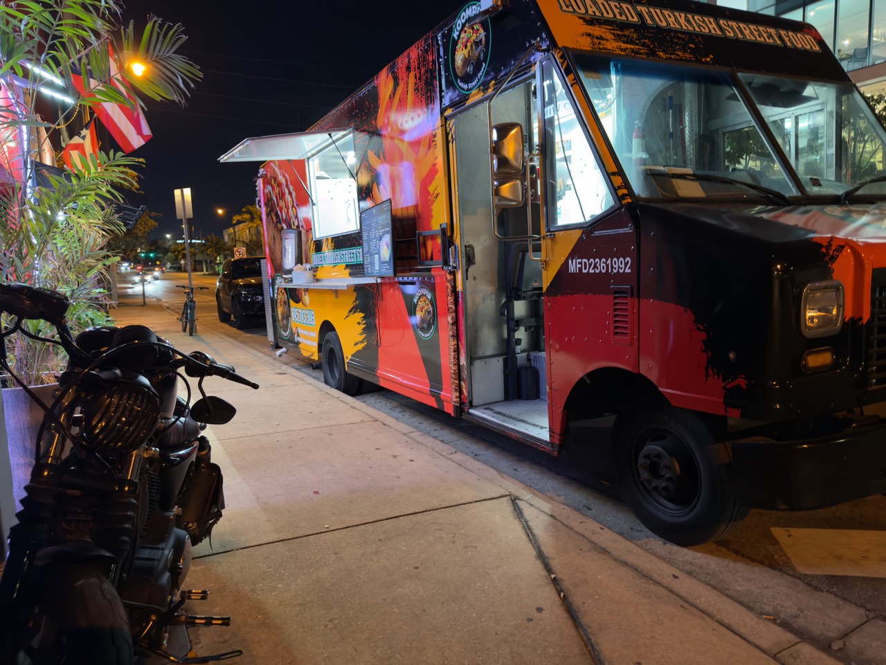 Koompir food truck at night on Miami street